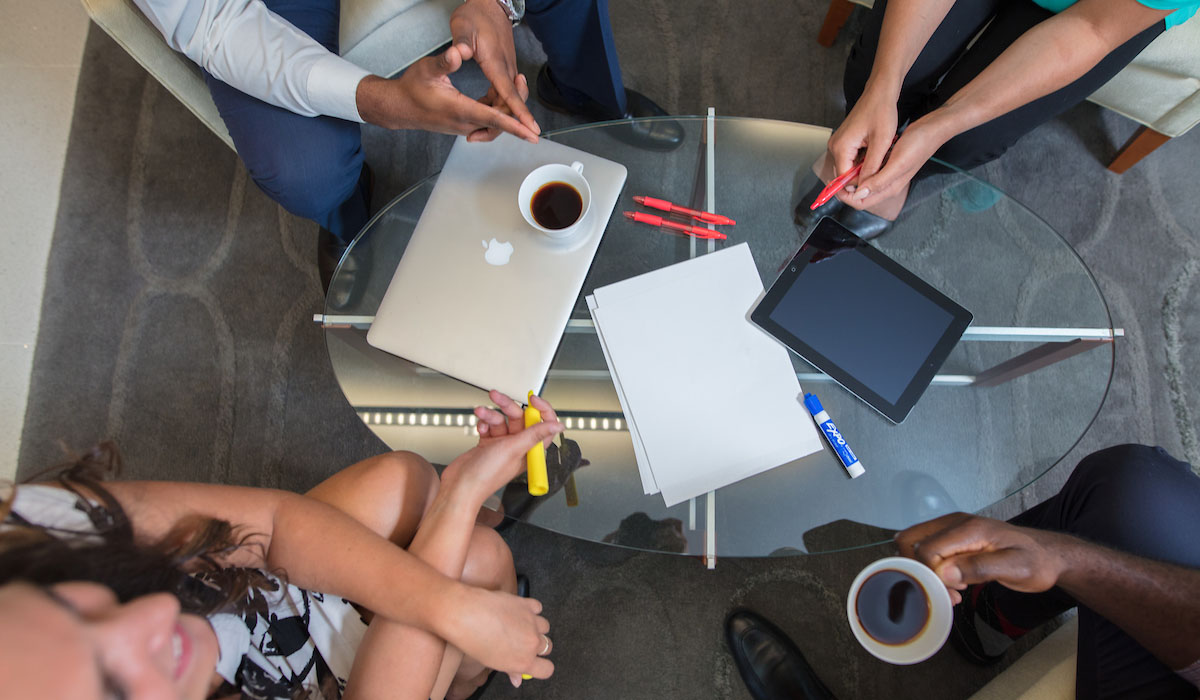 professional overhead photo of a commercial business meeting