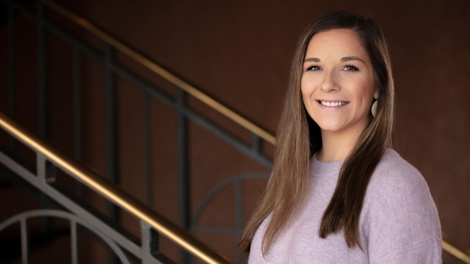 headshot of brunette female attorney