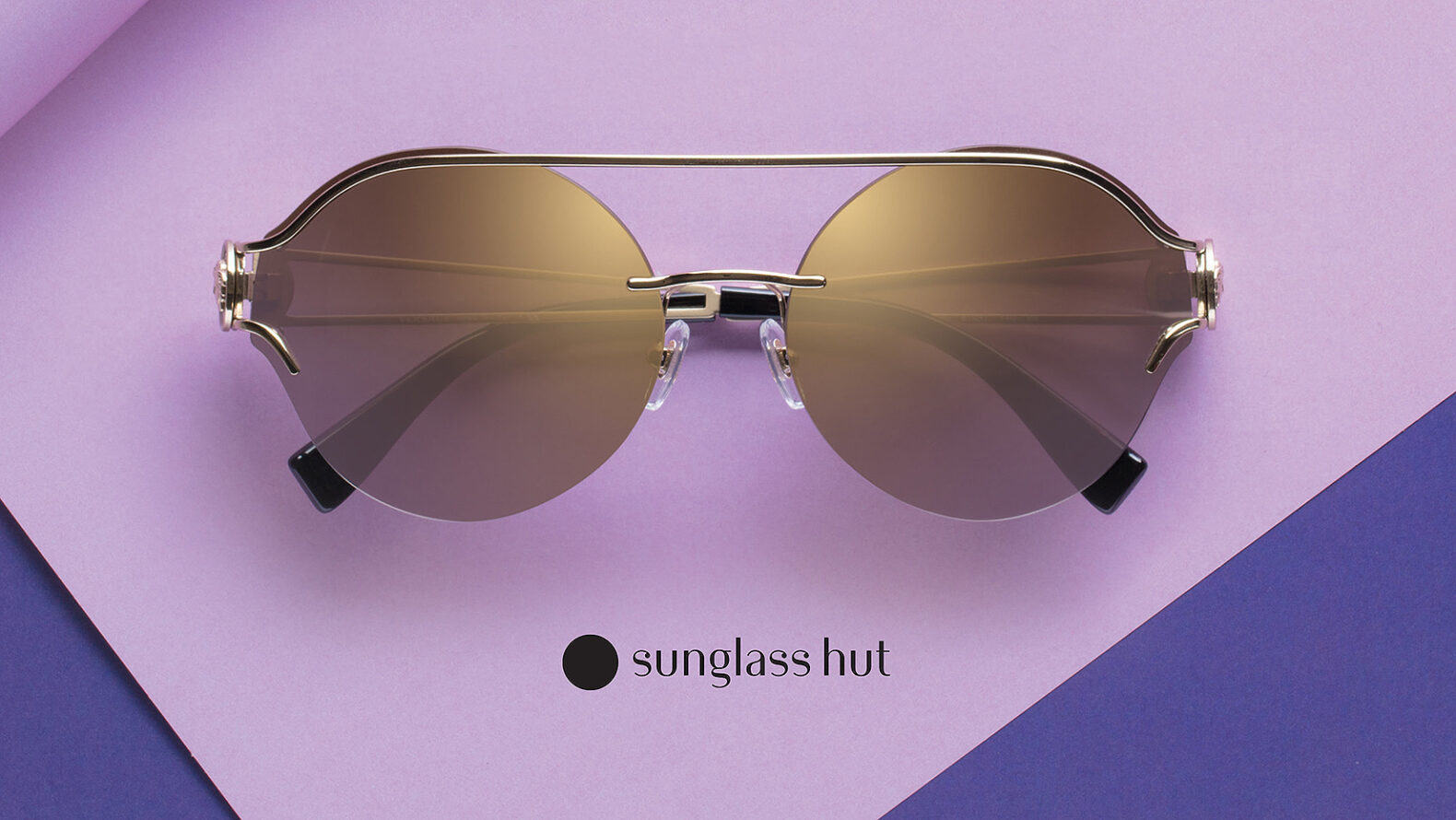 advertising photo of sunglass hut pair of sunglasses