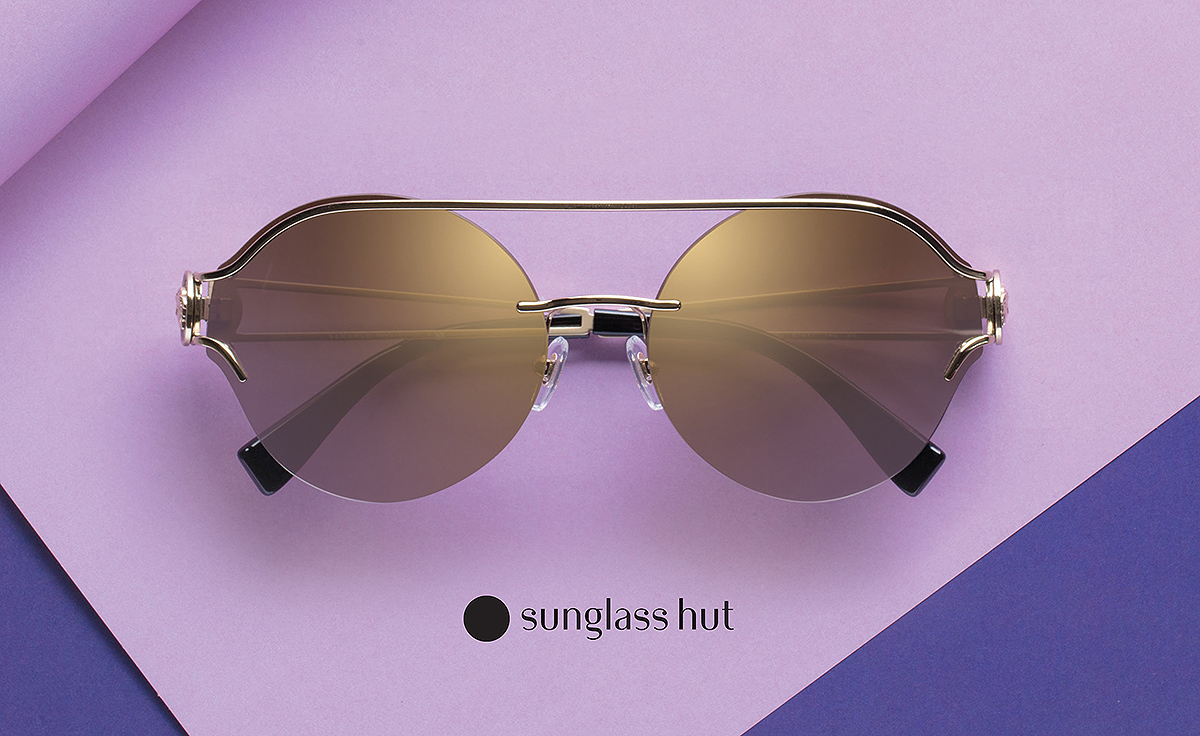 Sunglass Hut product advertising photo of pair of sunglasses