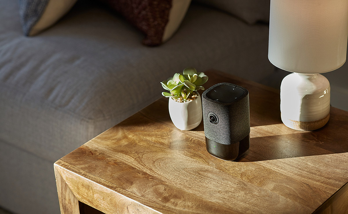 wireless speaker and camera system on side table