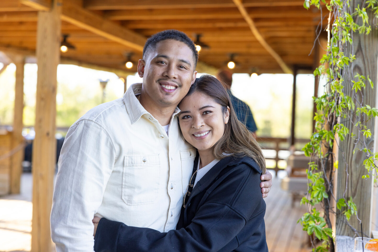 couple posing for picture at corporate event